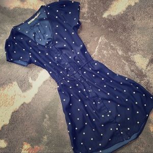 Mini dress in navy with white polka dots